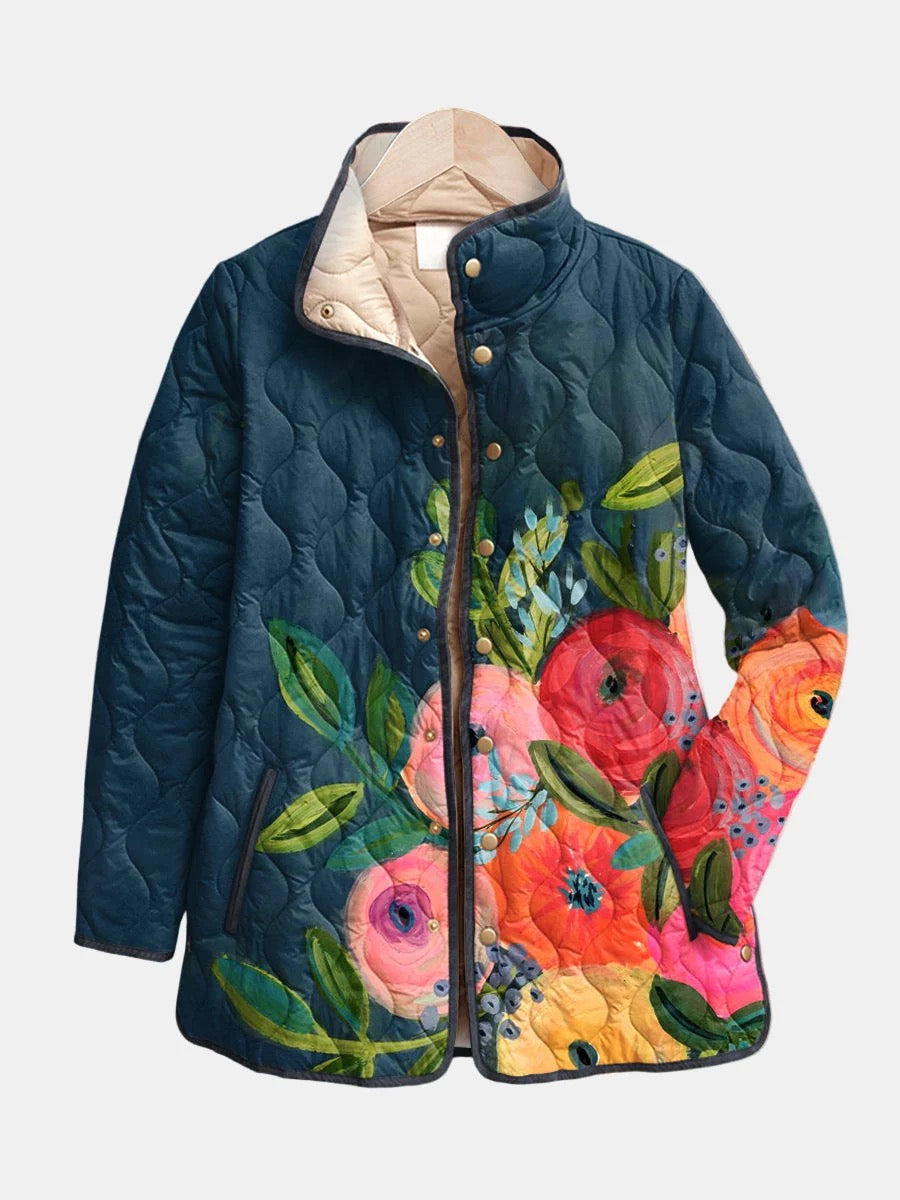 QUILTET JAKKE MED BLOMSTERTRYKK